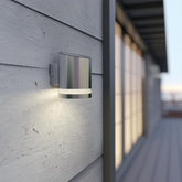 Modern outdoor wall light fixture on a concrete wall